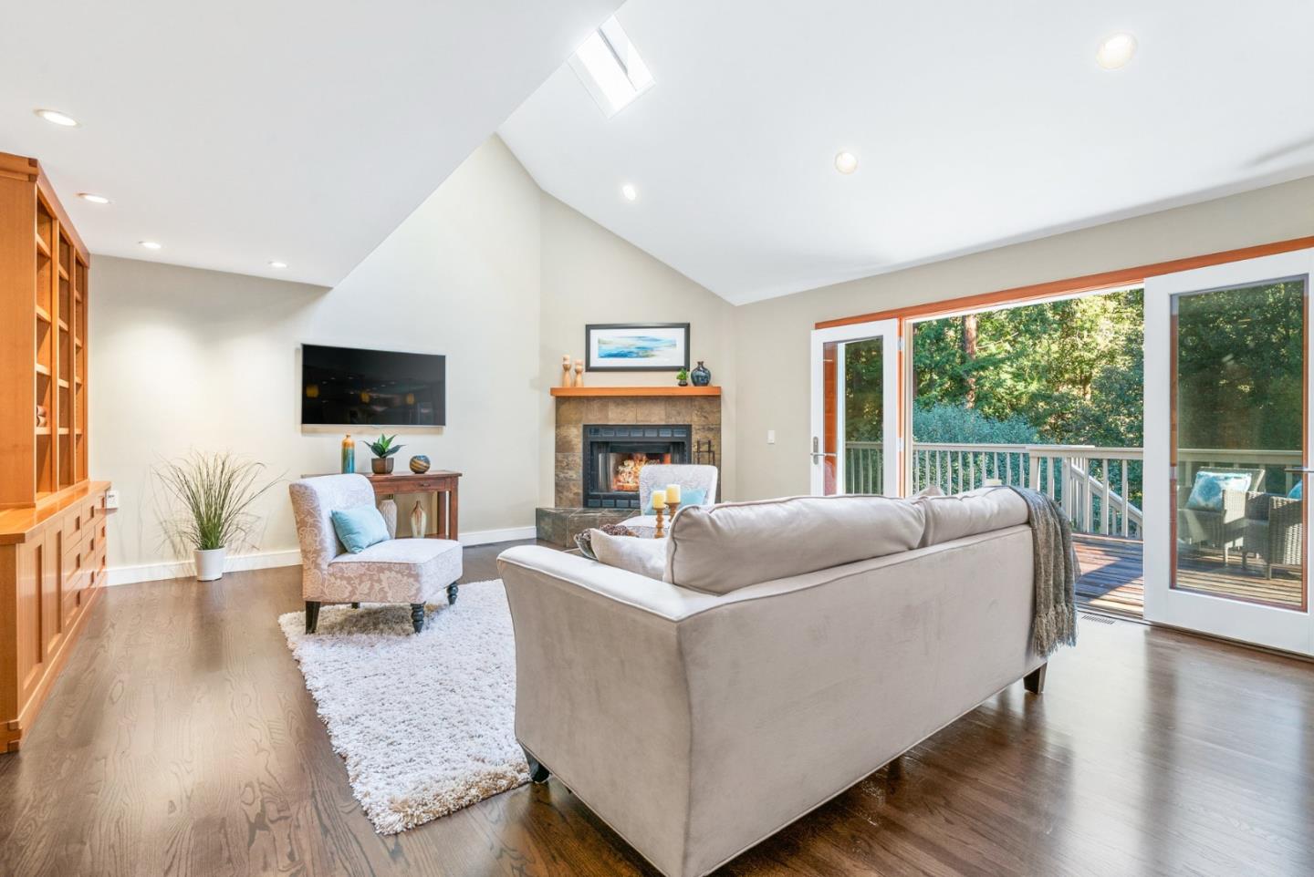 500 Bear Valley Road Aptos, CA 95003 - Photo 37 of 91 a living room with furniture flat screen tv and a large window