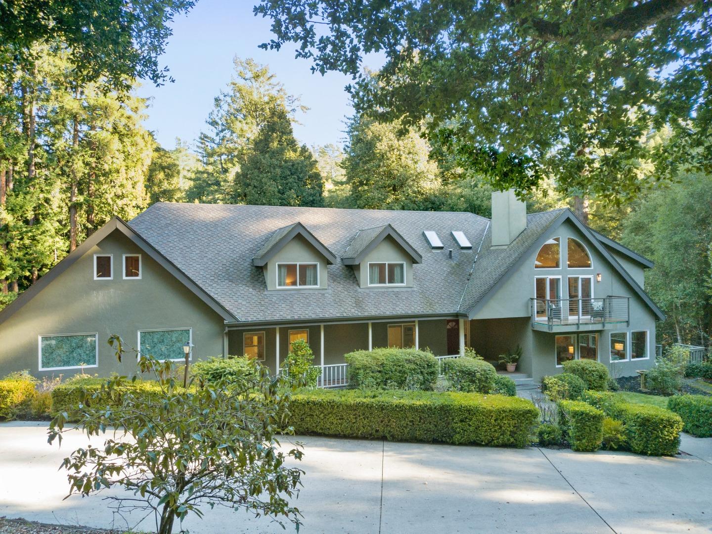 500 Bear Valley Road Aptos, CA 95003 - Photo 5 of 91 a front view of a house with a yard