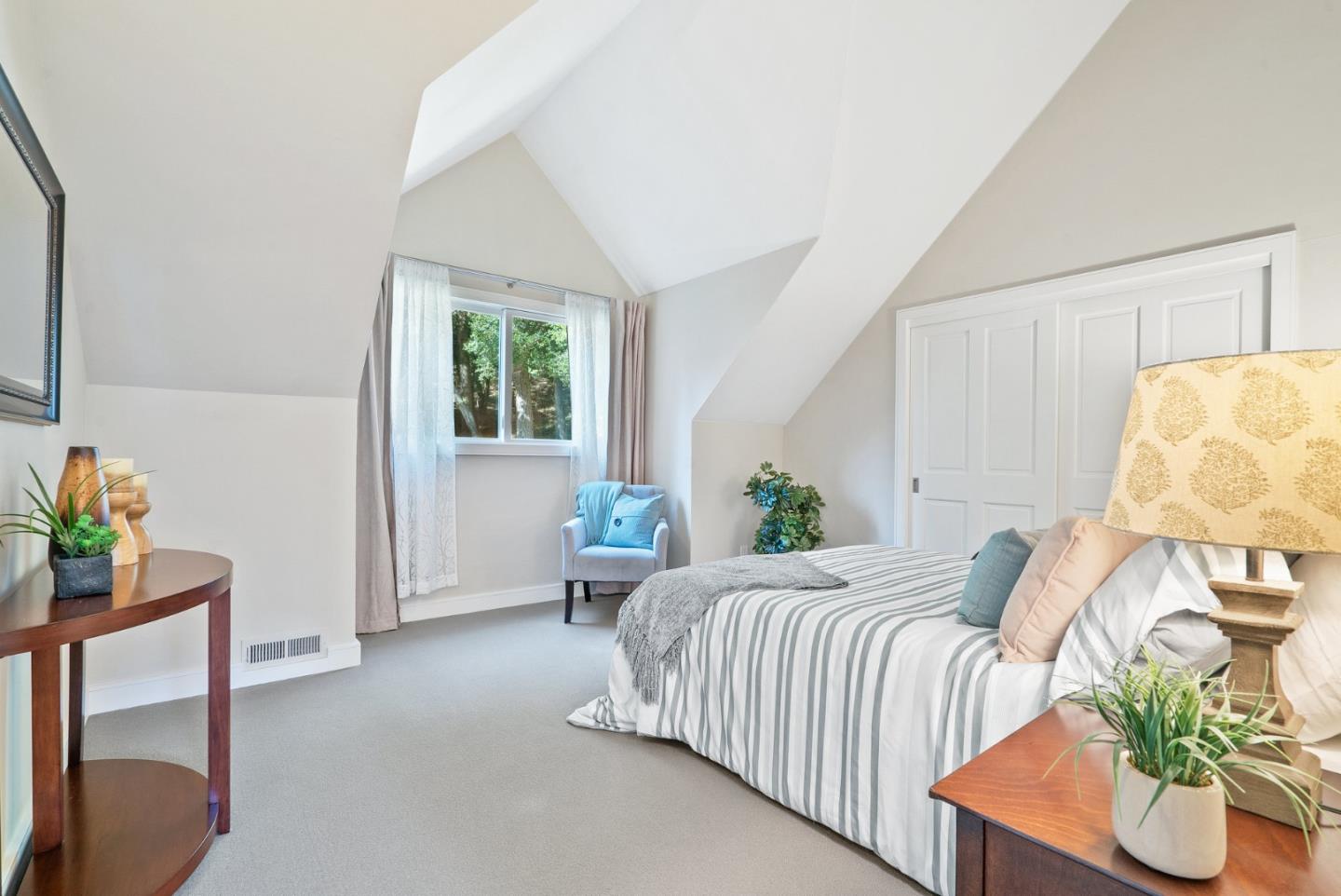 500 Bear Valley Road Aptos, CA 95003 - Photo 62 of 91 a bedroom with bed and a window