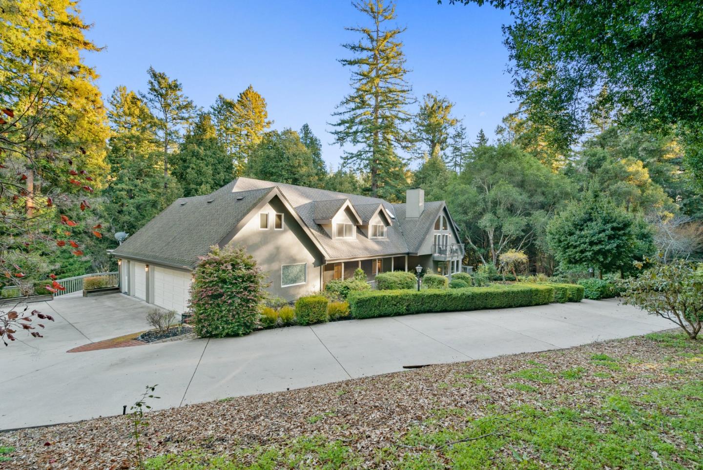 500 Bear Valley Road Aptos, CA 95003 - Photo 85 of 91 a front view of a house with a yard and trees