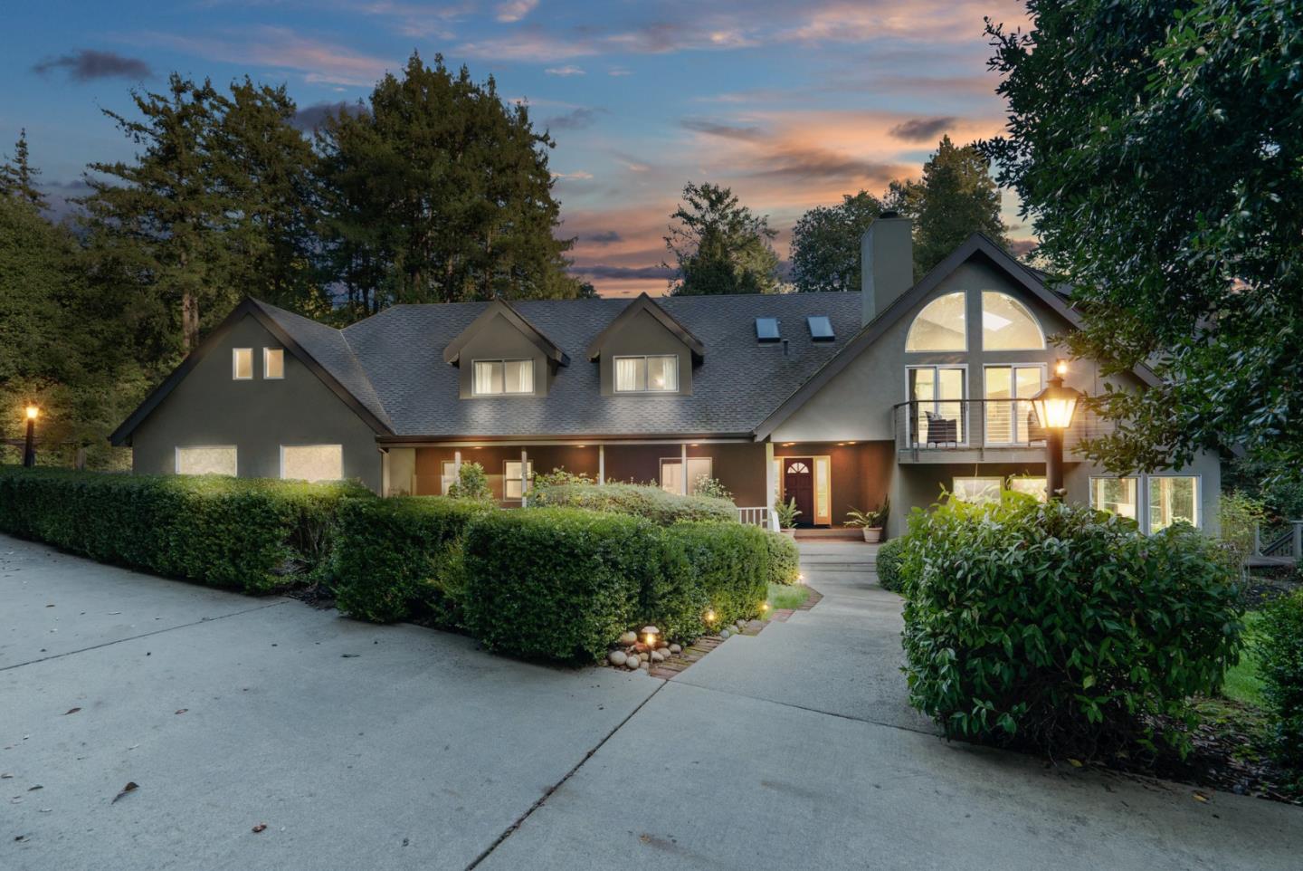 500 Bear Valley Road Aptos, CA 95003 - Photo 89 of 91 a front view of a house with a yard and potted plants