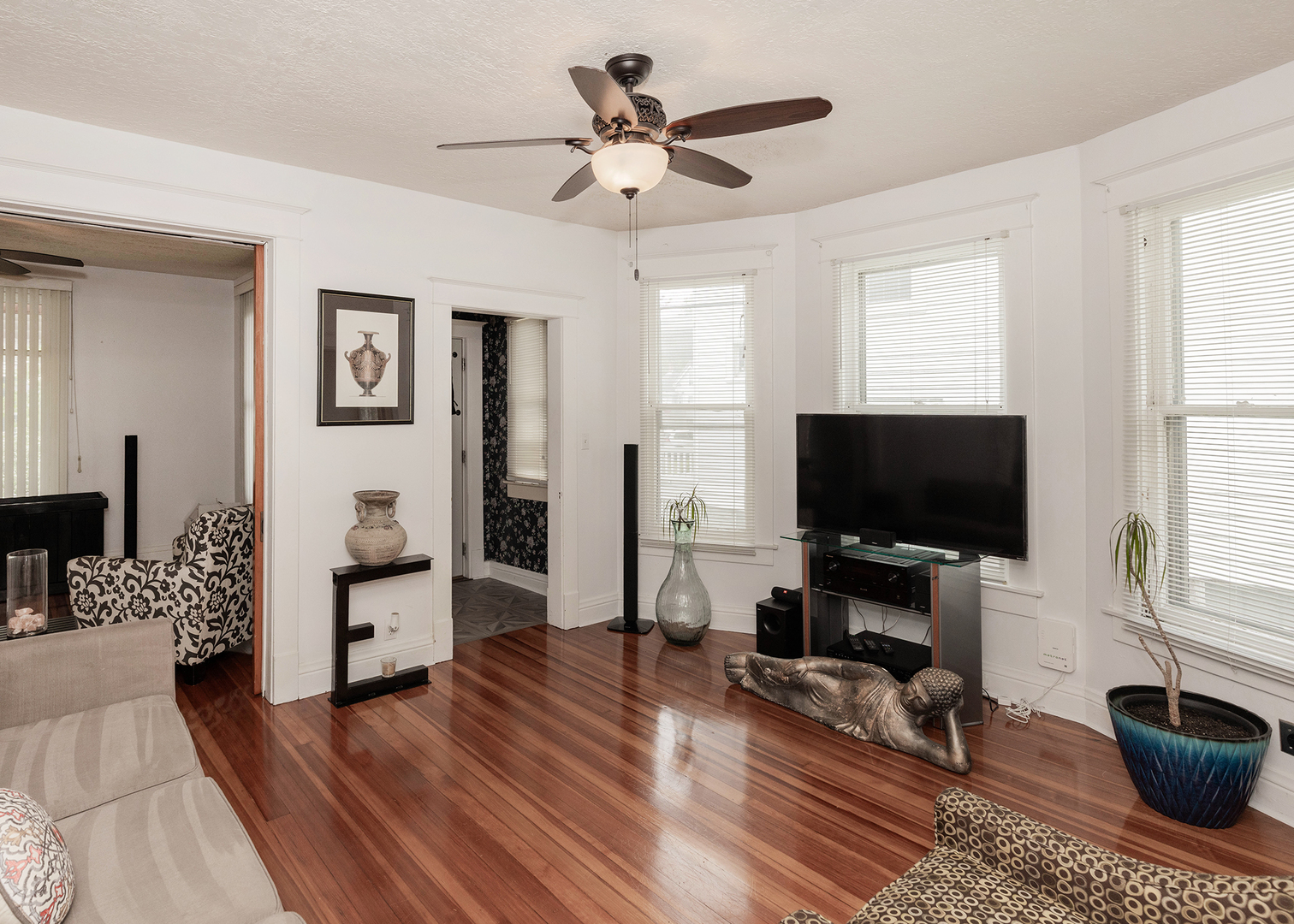 1839 15th Street Moline, IL 61265 - Photo 13 of 32 a living room with furniture and a flat screen tv