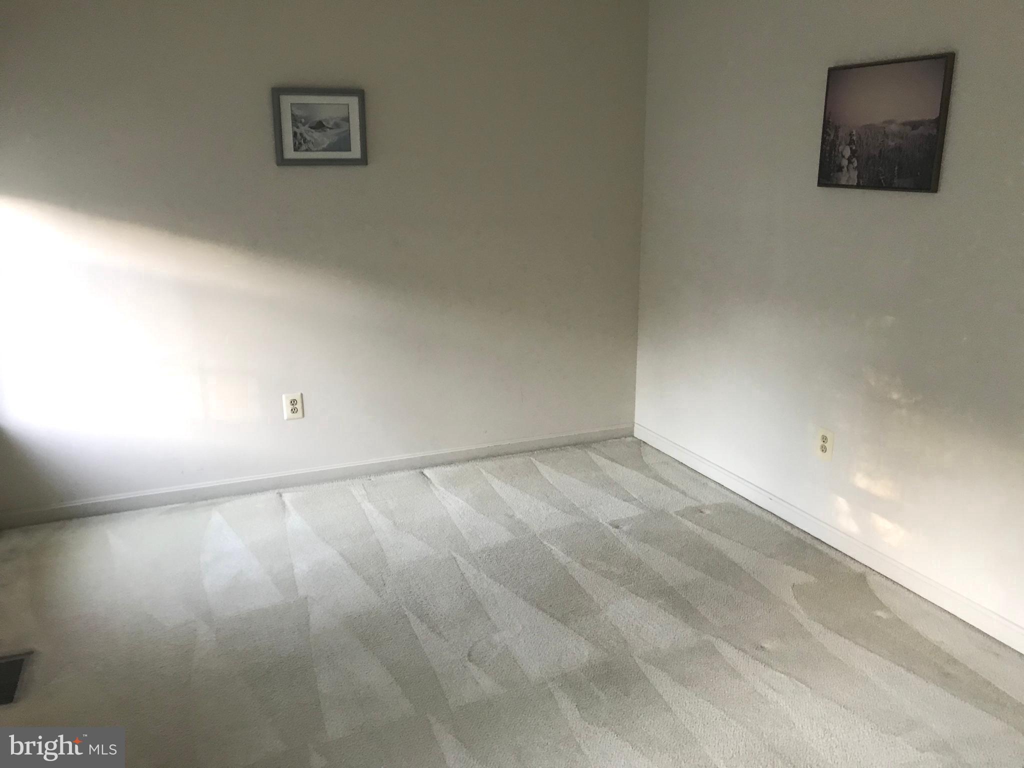 9513 Stoneoak Road Baltimore, MD 21236 - Photo 22 of 36 a view of an empty room