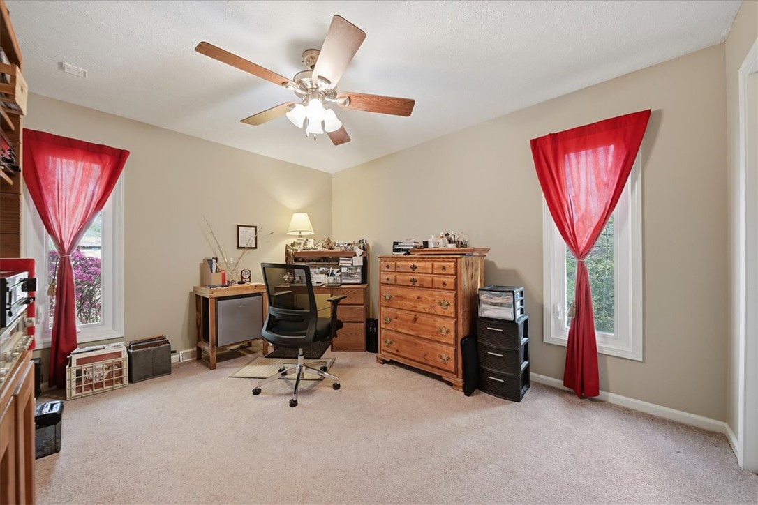 729 State Rd S-37-359 Seneca, SC 29672 - Photo 18 of 35 This versatile space offers comfort and functionality, perfect for work or relaxation.