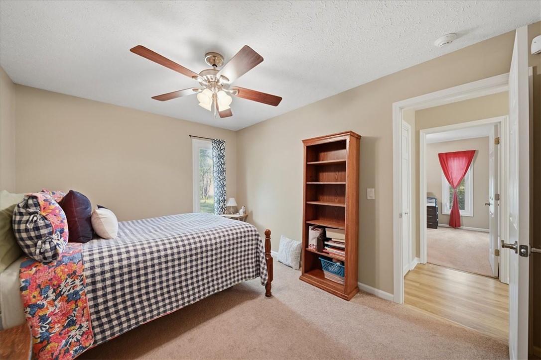 729 State Rd S-37-359 Seneca, SC 29672 - Photo 20 of 35 This cozy bedroom offers comfort and a tranquil ambiance with ample natural light.