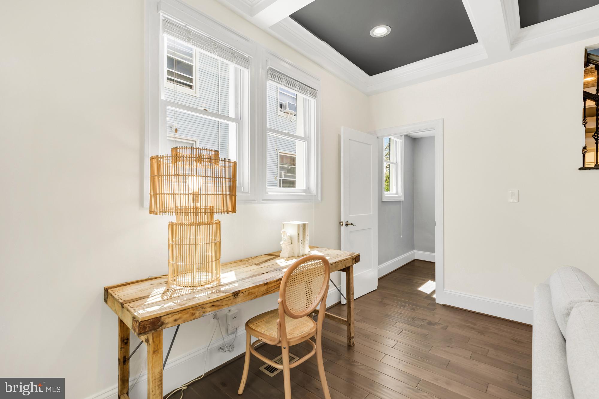 1202 Decatur Street Northwest Washington, DC 20011 - Photo 13 of 53 a view of a dining room with furniture and wooden floor