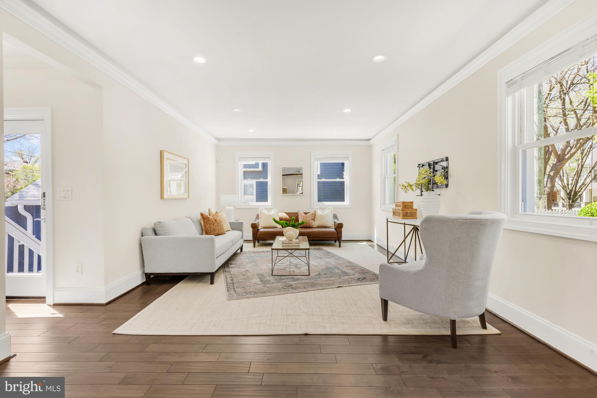 1202 Decatur Street Northwest Washington, DC 20011 - Photo 23 of 53 a living room with furniture and a window