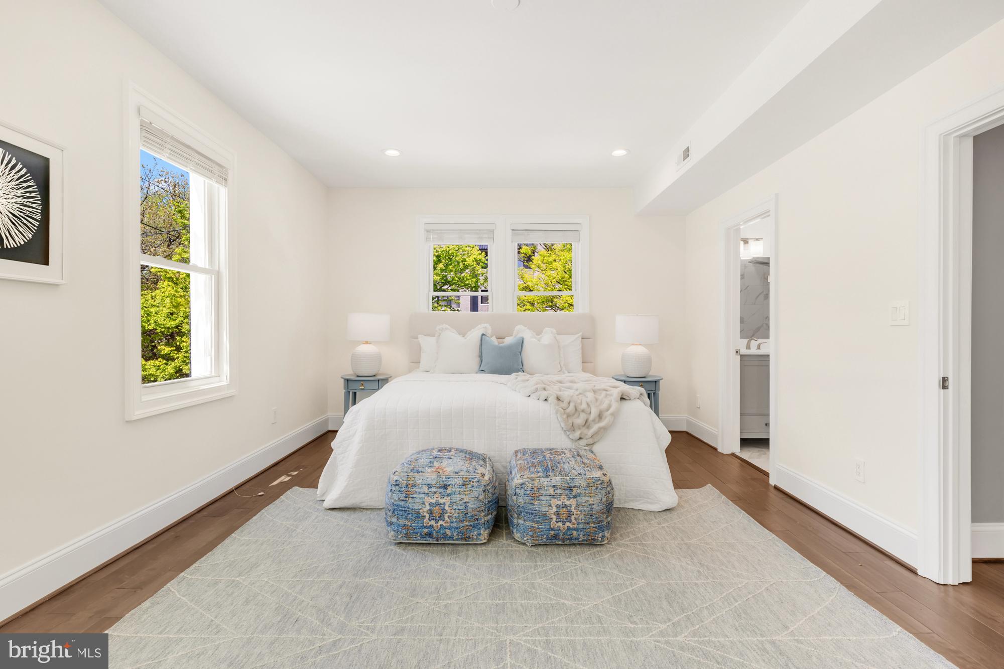 1202 Decatur Street Northwest Washington, DC 20011 - Photo 30 of 53 a bedroom with a bed and a window