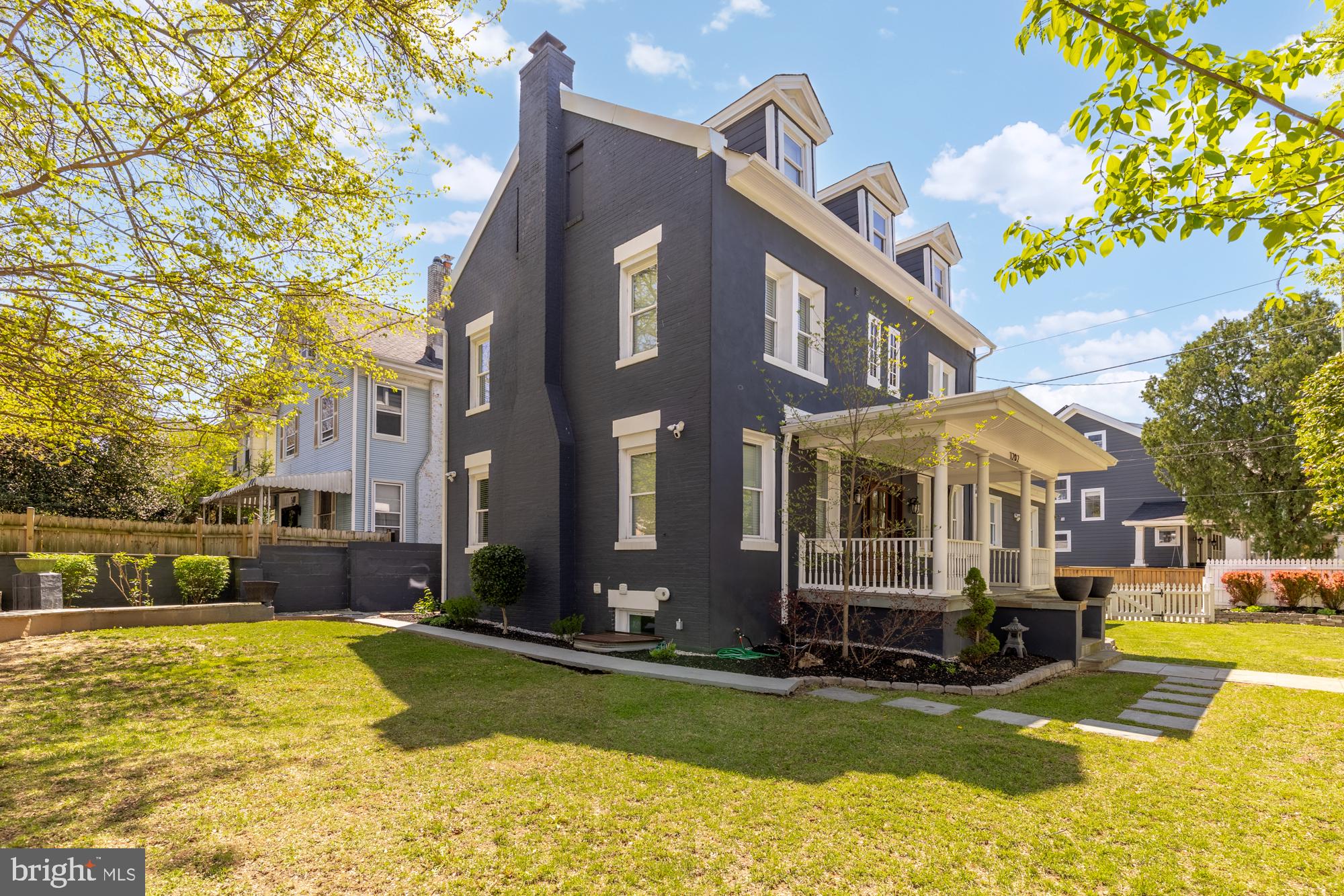1202 Decatur Street Northwest Washington, DC 20011 - Photo 3 of 53 a view of a house with a swimming pool