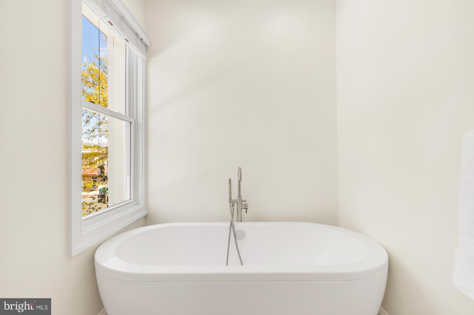 1202 Decatur Street Northwest Washington, DC 20011 - Photo 34 of 53 a bathroom with a tub