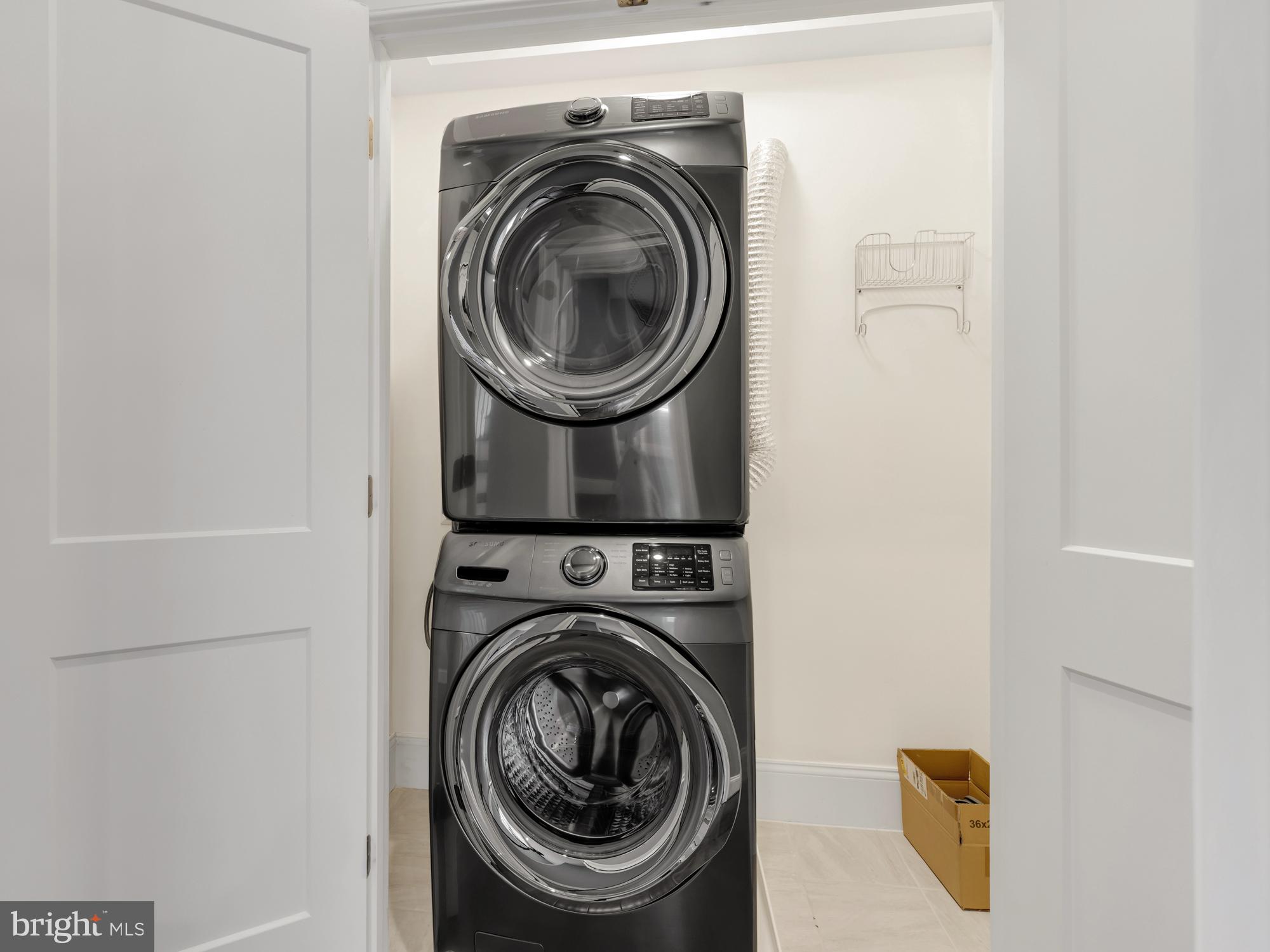 1202 Decatur Street Northwest Washington, DC 20011 - Photo 38 of 53 a utility room with dryer and washer