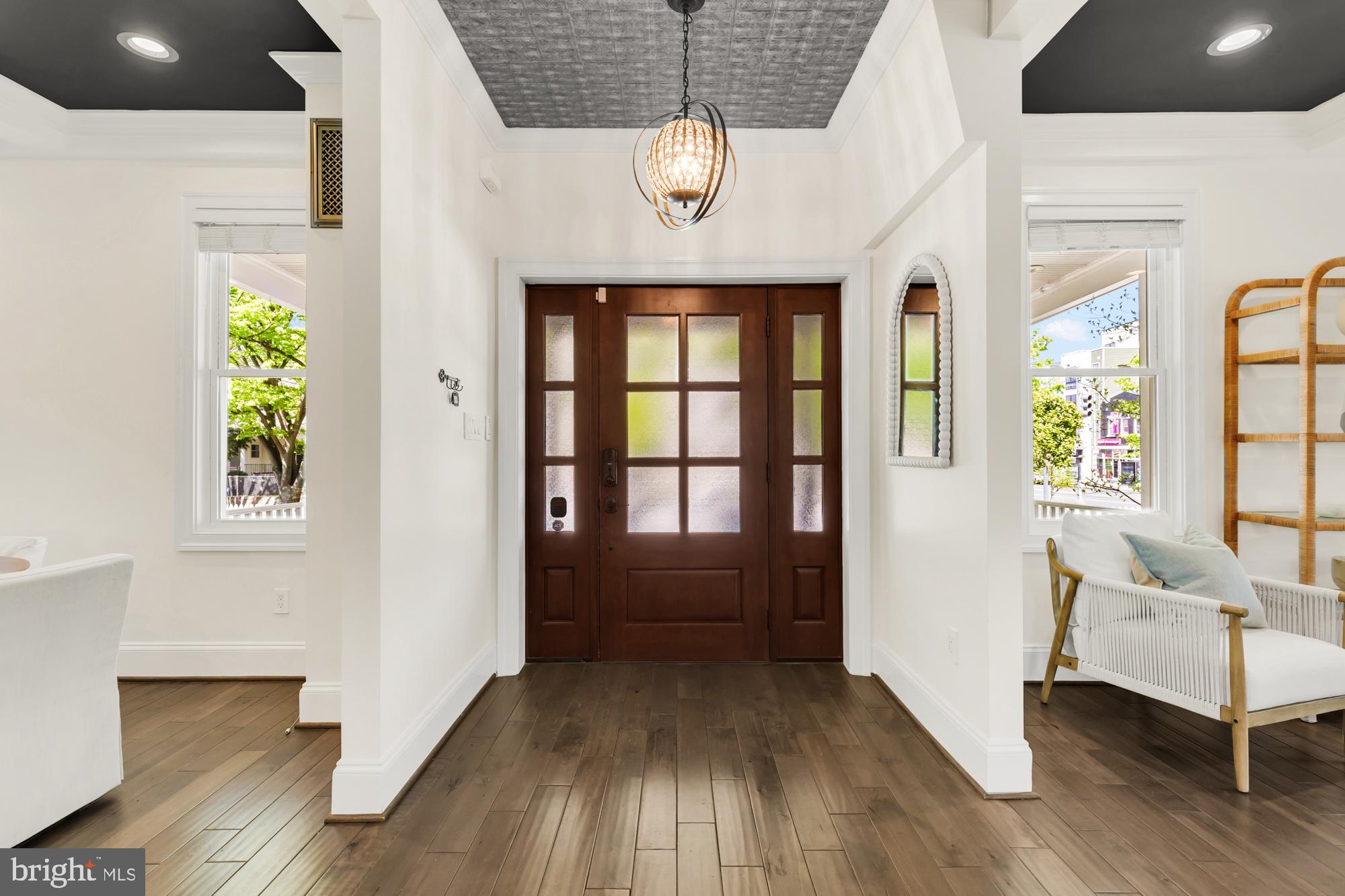 1202 Decatur Street Northwest Washington, DC 20011 - Photo 8 of 53 a view of empty room with wooden floor and fan