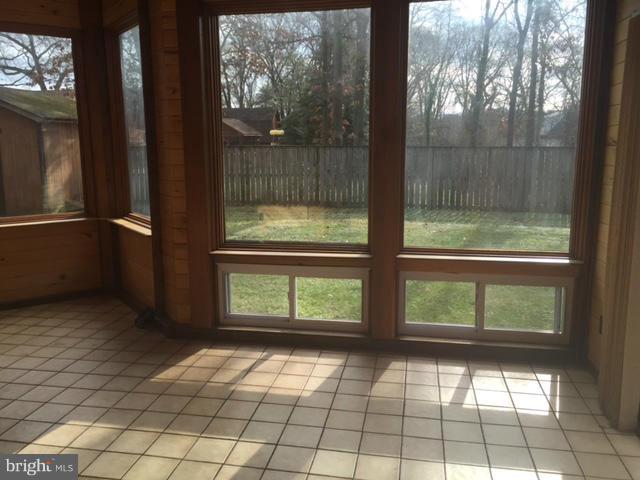 311 Magothy Bridge Road Pasadena, MD 21122 - Photo 14 of 20 Sun Room overlooking Yard