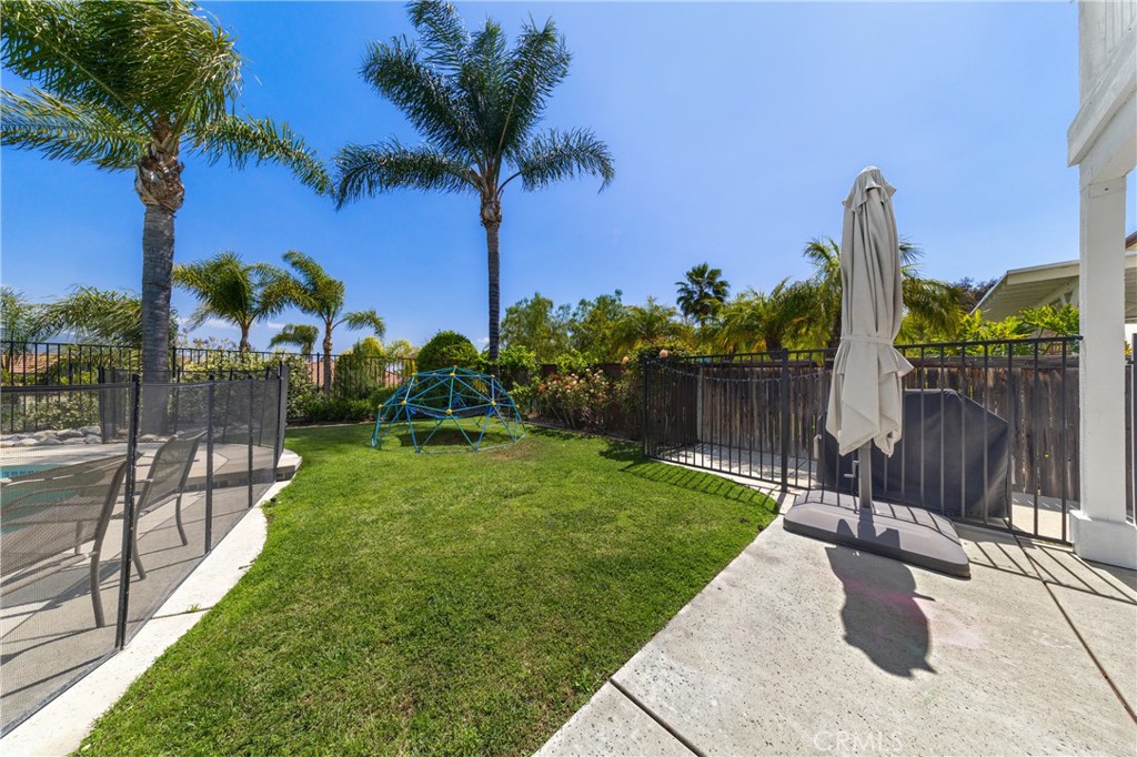 32985 Novara Court Temecula, CA 92592 - Photo 9 of 56 Private Fenced Grass Area Offering Additional Outdoor Space For Play, Pets, Or Relaxation