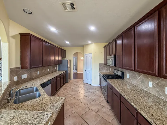 $345,000 | 1610 Mason Knights Drive, Katy, TX 77493