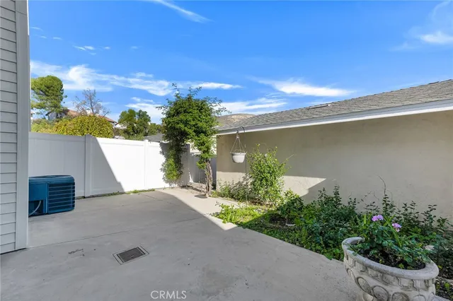 a view of a back yard of the house