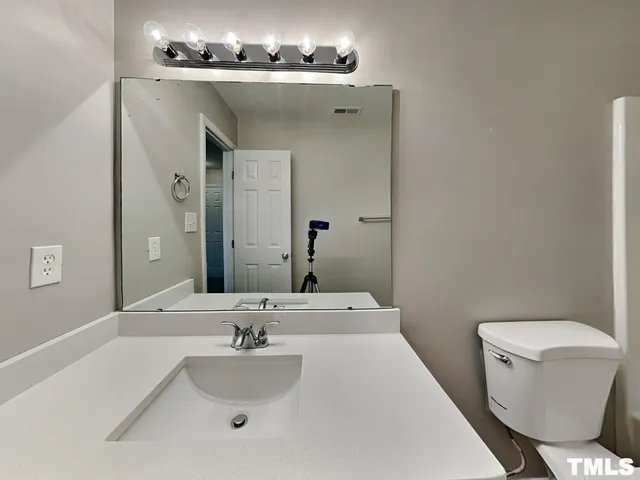 an empty room with a natural light