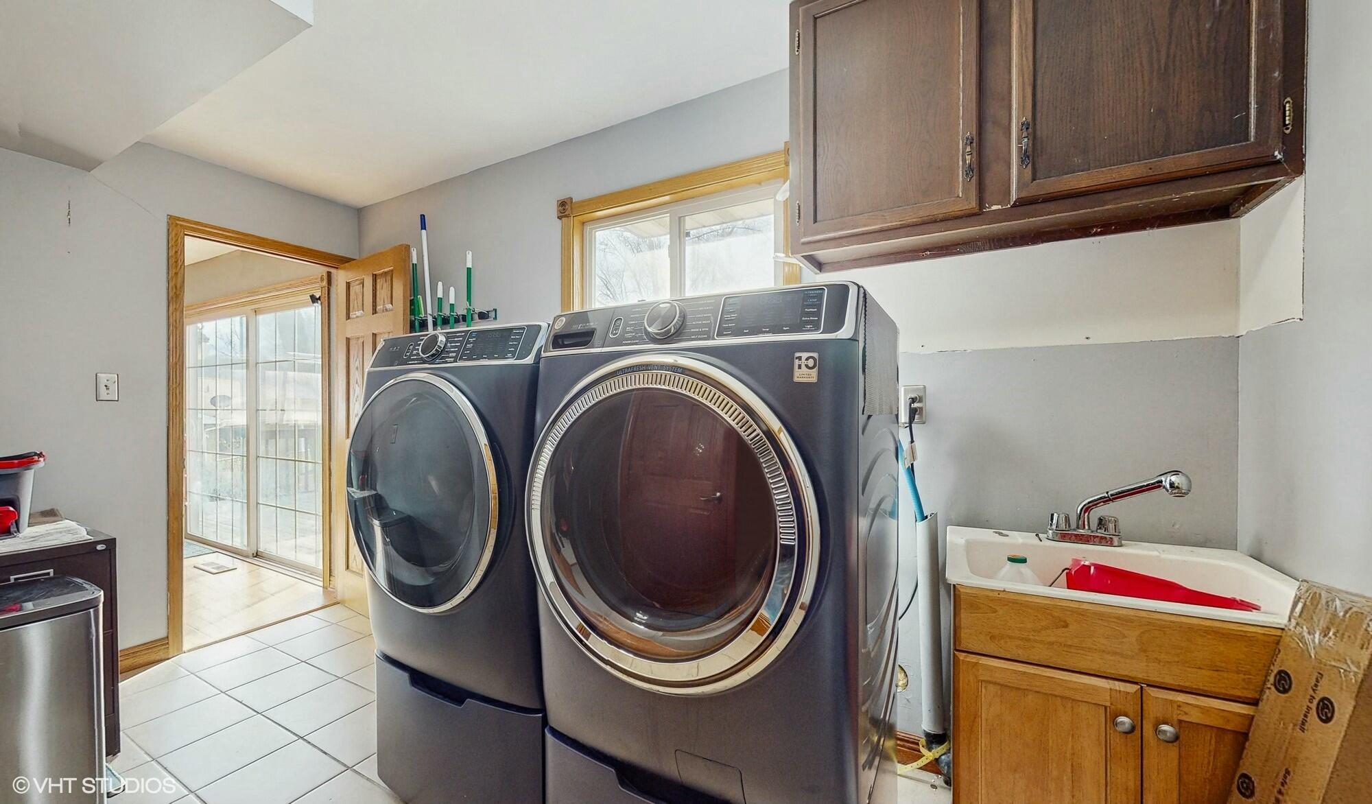 1980 Greenvalley Drive Crown Point, IN 46307 - Photo 18 of 45 a utility room with dryer and washer