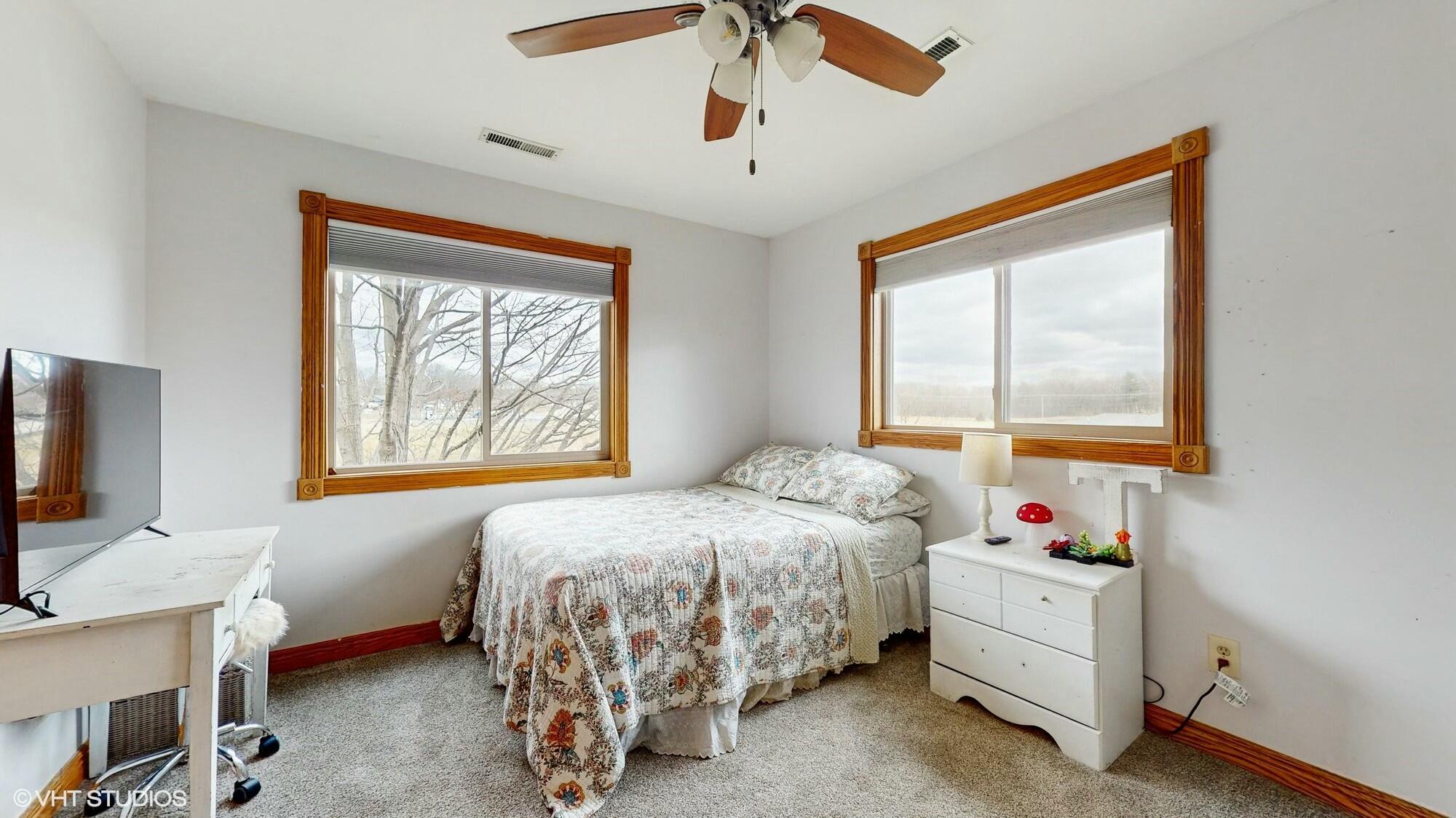 1980 Greenvalley Drive Crown Point, IN 46307 - Photo 23 of 45 a bedroom with a bed and a window