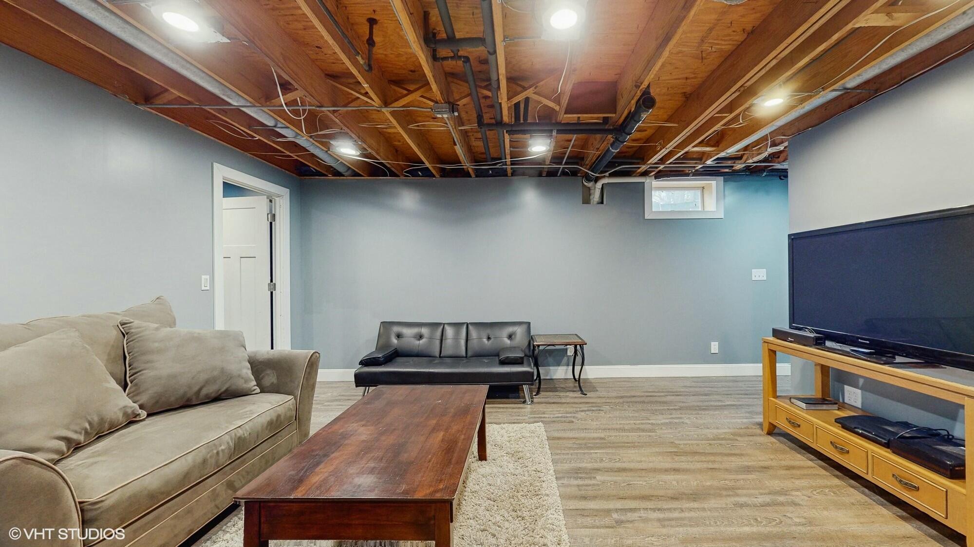 1980 Greenvalley Drive Crown Point, IN 46307 - Photo 29 of 45 a living room with furniture and a flat screen tv