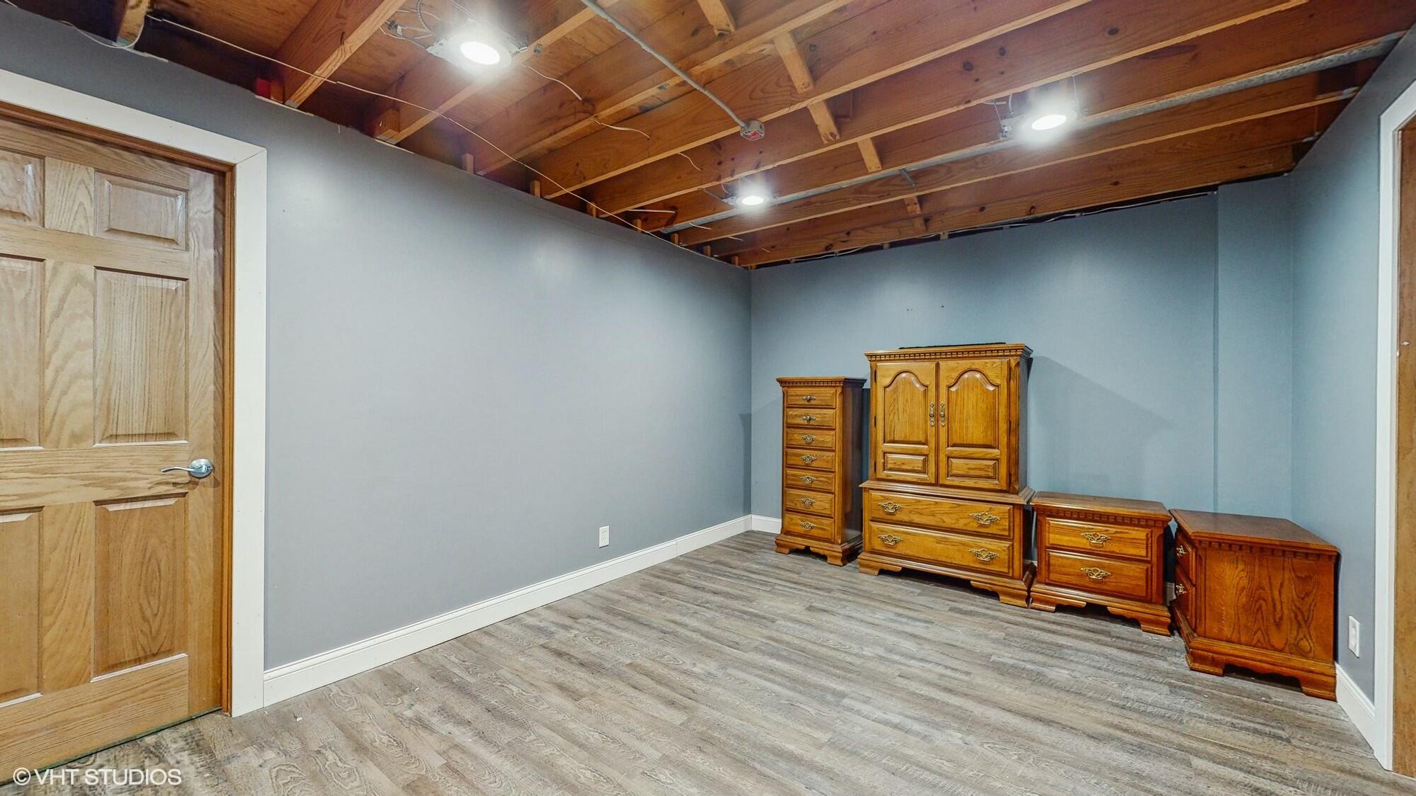 1980 Greenvalley Drive Crown Point, IN 46307 - Photo 30 of 45 a view of room with wooden floor