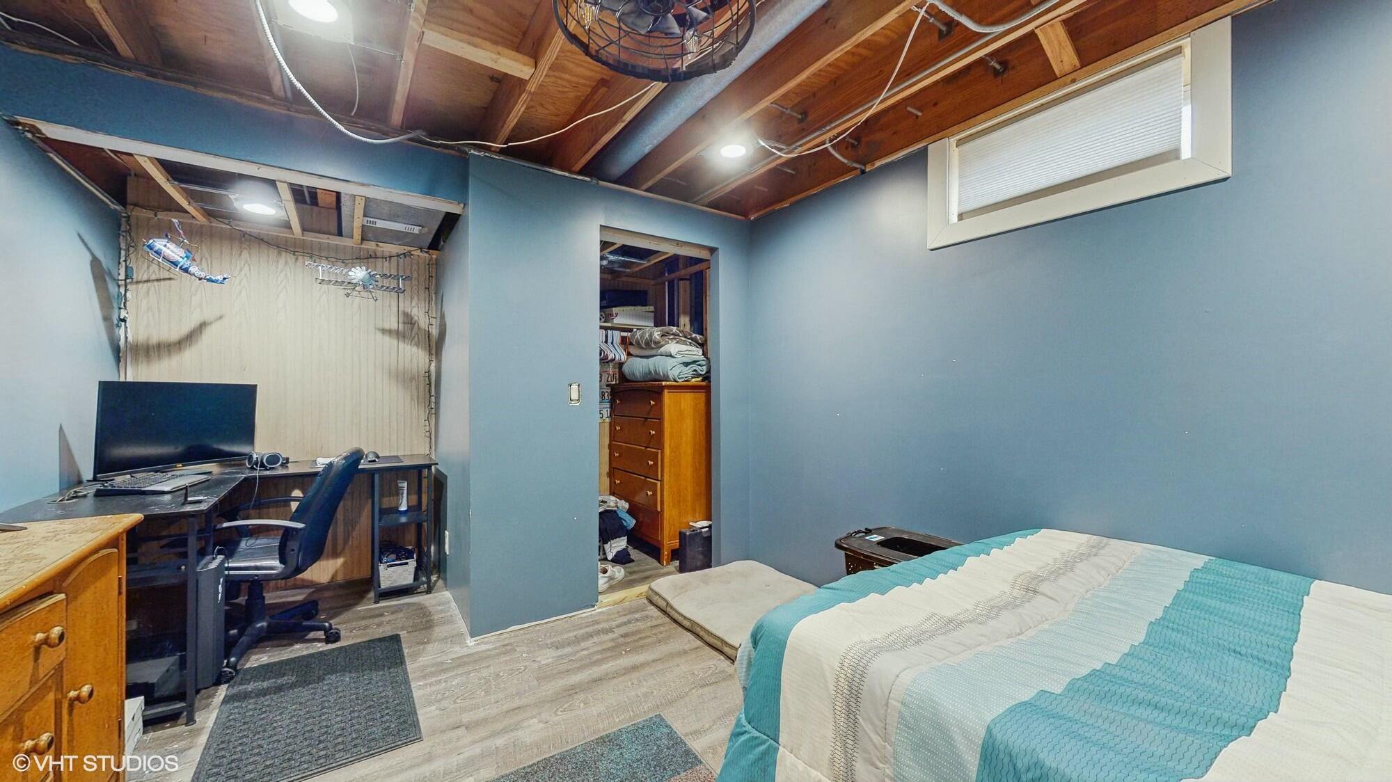 1980 Greenvalley Drive Crown Point, IN 46307 - Photo 31 of 45 a bedroom with a bed and a desk