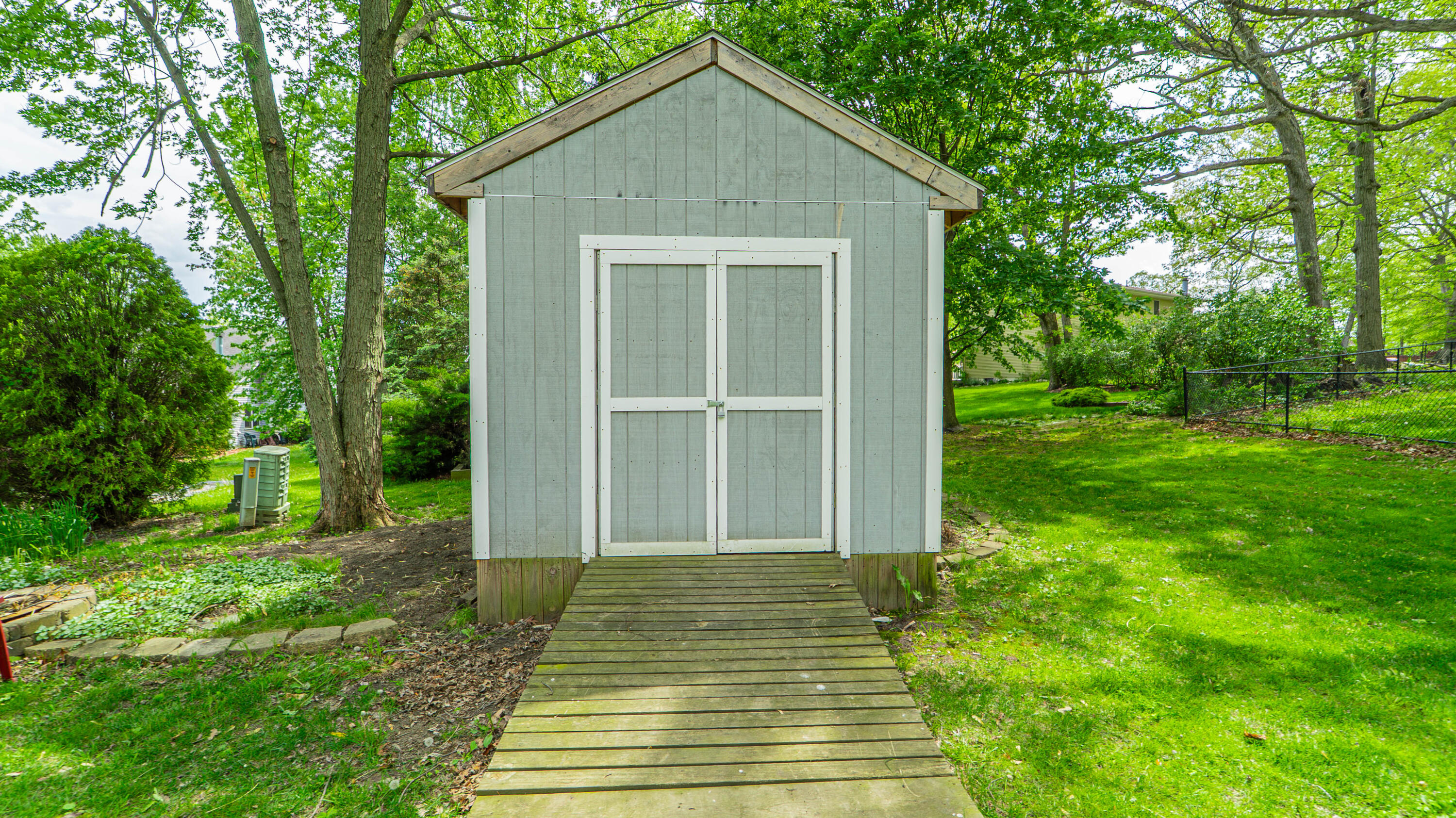1980 Greenvalley Drive Crown Point, IN 46307 - Photo 33 of 45 a front view of a house with a yard