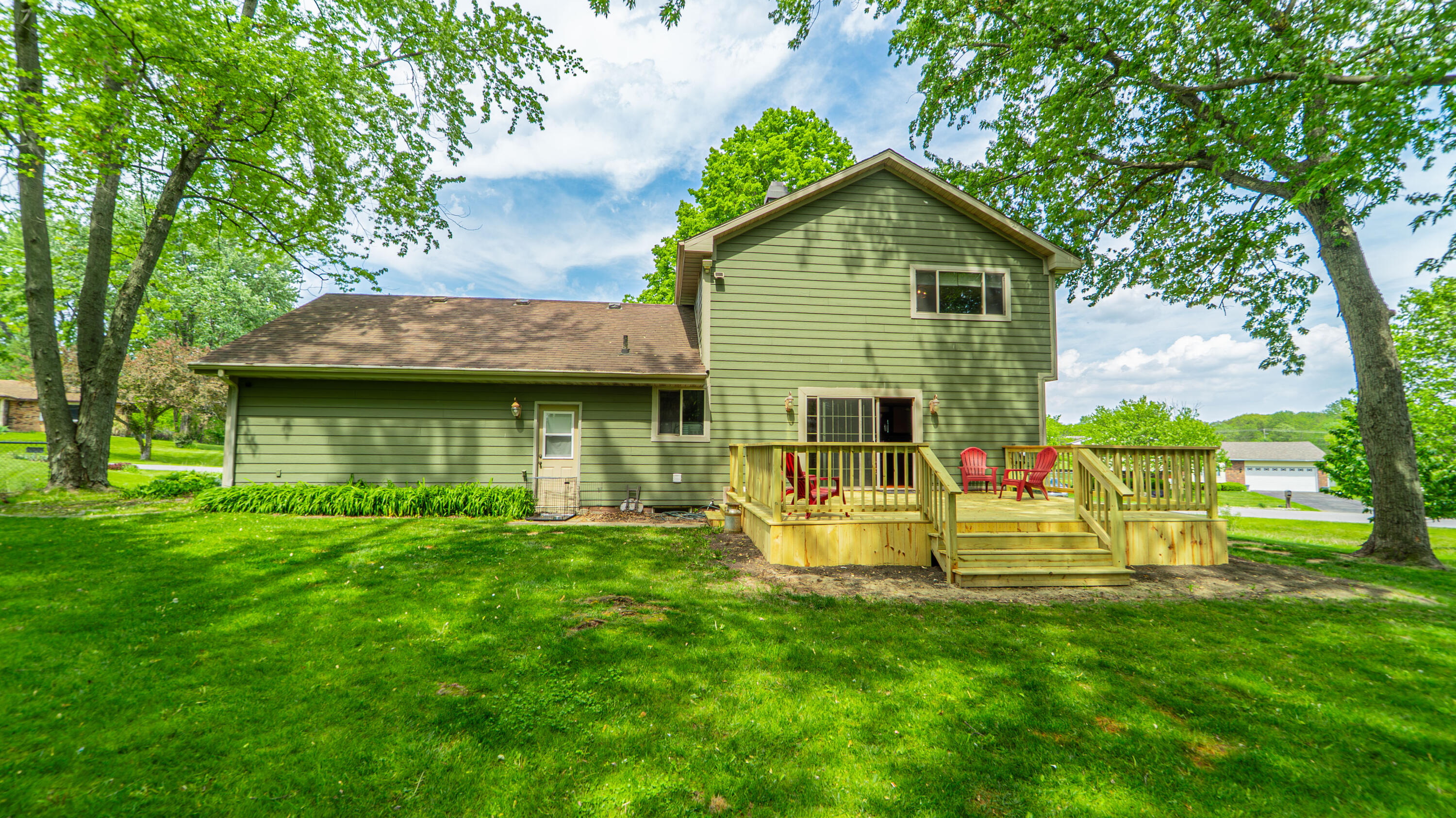 1980 Greenvalley Drive Crown Point, IN 46307 - Photo 35 of 45 a view of a house with a yard and sitting area