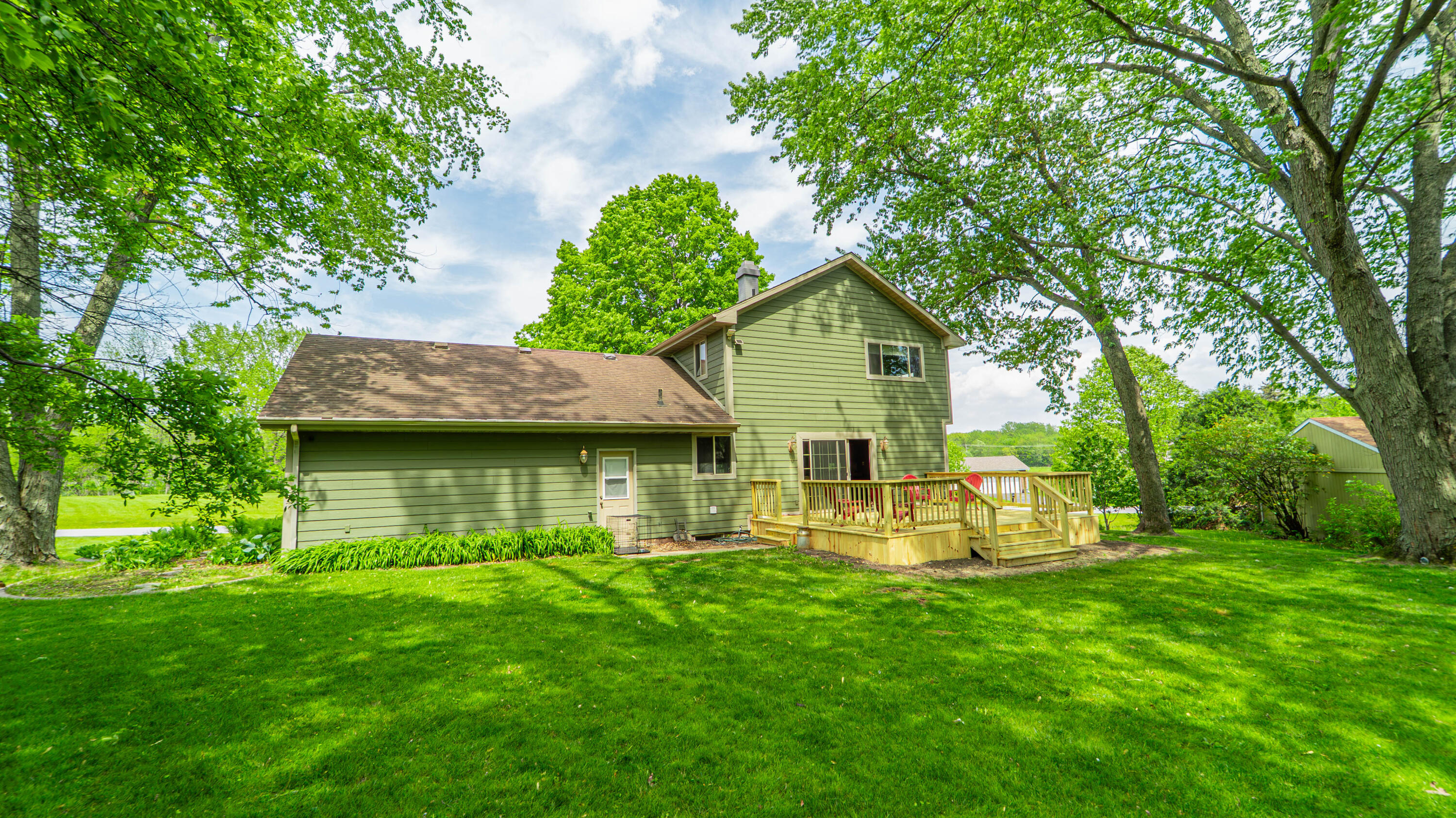 1980 Greenvalley Drive Crown Point, IN 46307 - Photo 36 of 45 a view of house with backyard and outdoor seating