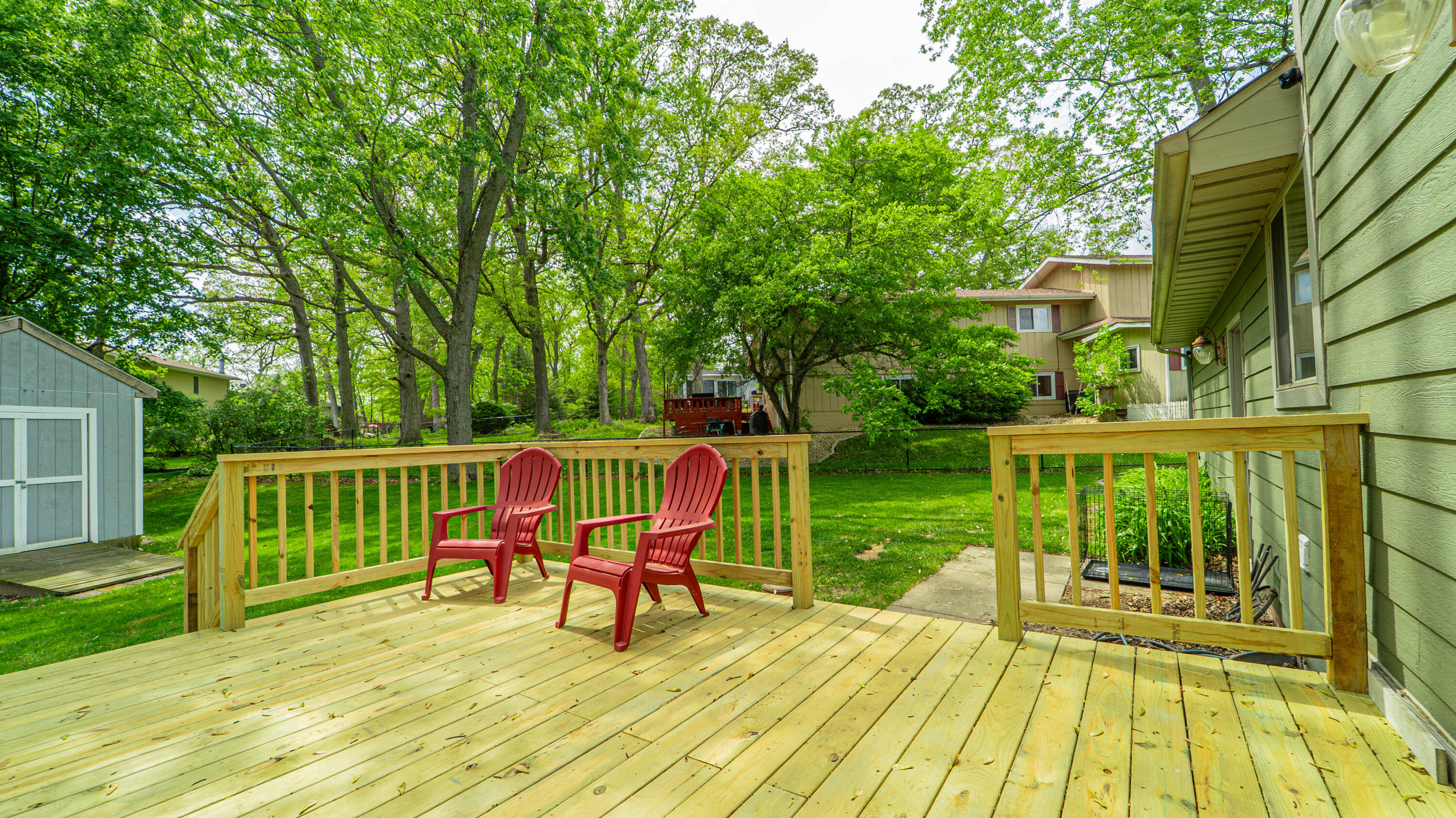 1980 Greenvalley Drive Crown Point, IN 46307 - Photo 40 of 45 a view of a deck with two chairs and a table