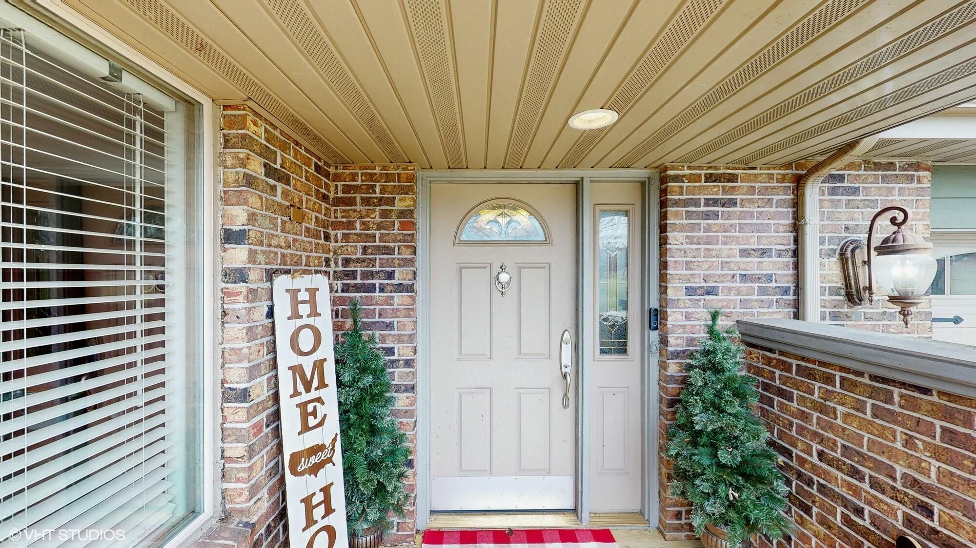 1980 Greenvalley Drive Crown Point, IN 46307 - Photo 4 of 45 a view of a hallway with front door