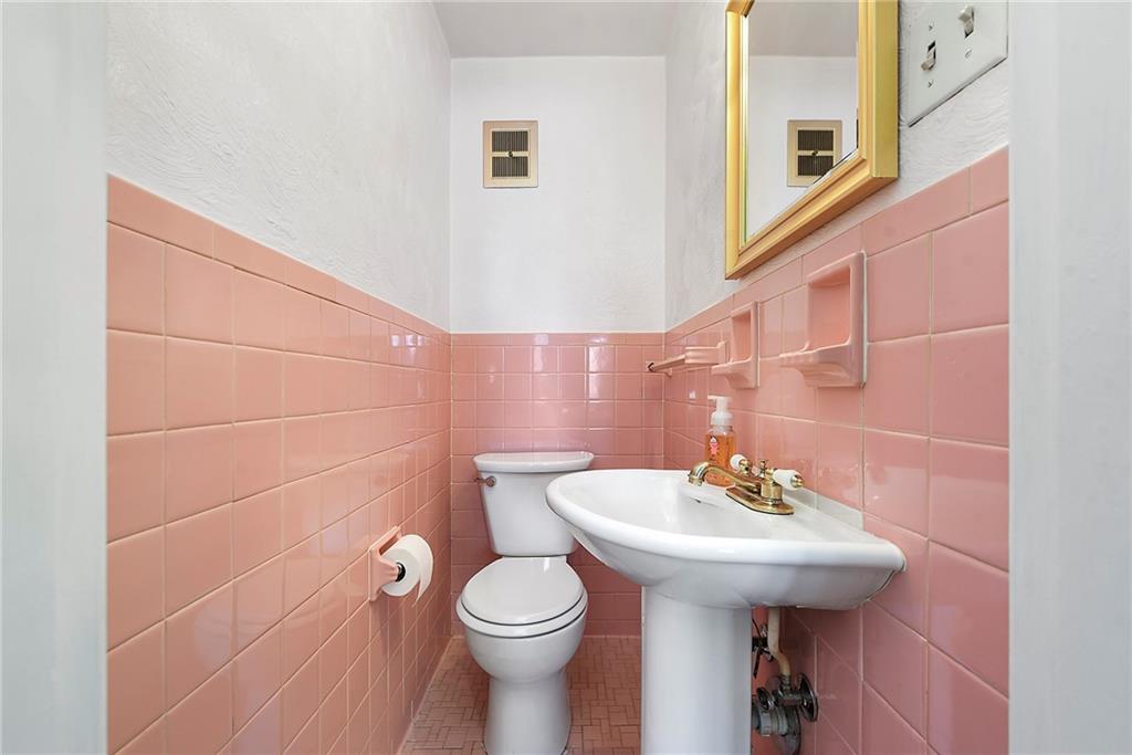 1315 Bower Hill Road Pittsburgh, PA 15243 - Photo 28 of 43 a bathroom with a sink toilet and a mirror