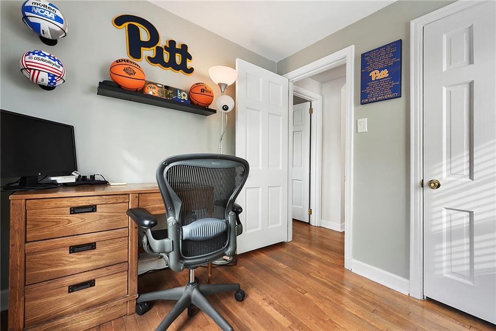1315 Bower Hill Road Pittsburgh, PA 15243 - Photo 30 of 43 a view of a workspace with furniture and wooden floor