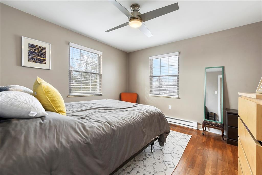 1315 Bower Hill Road Pittsburgh, PA 15243 - Photo 31 of 43 a bed sitting in a bedroom next to a window