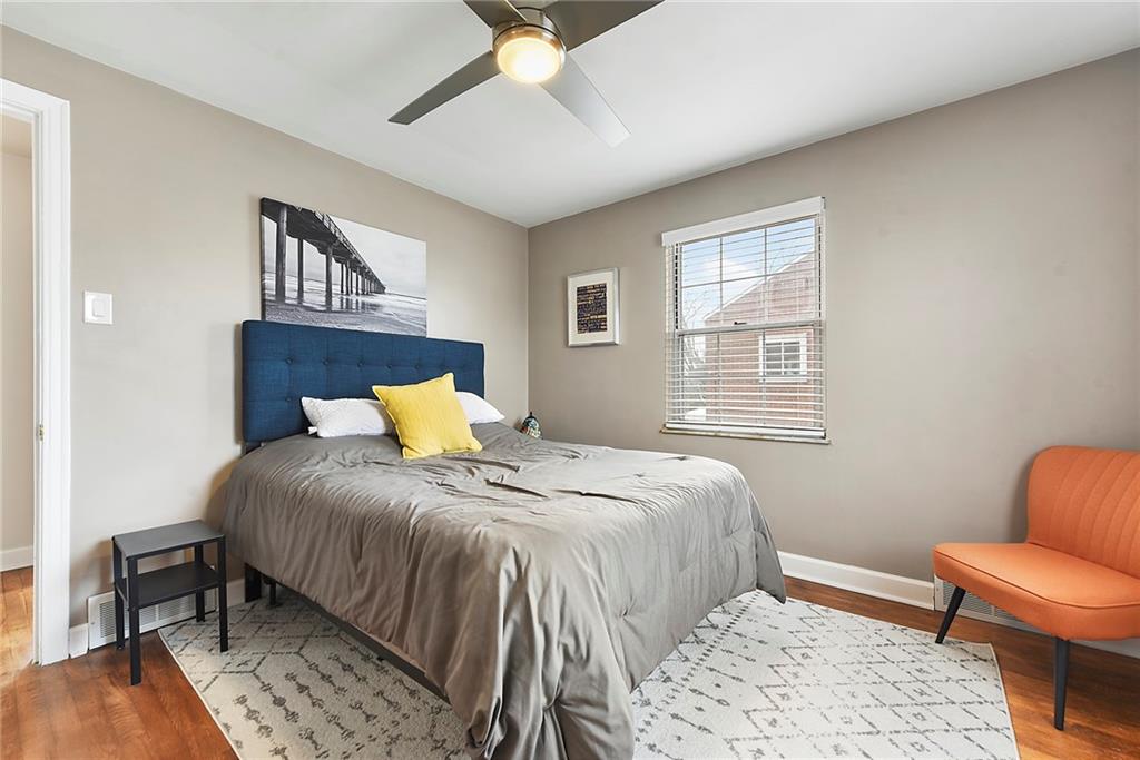 1315 Bower Hill Road Pittsburgh, PA 15243 - Photo 32 of 43 a bedroom with a bed and wooden floor