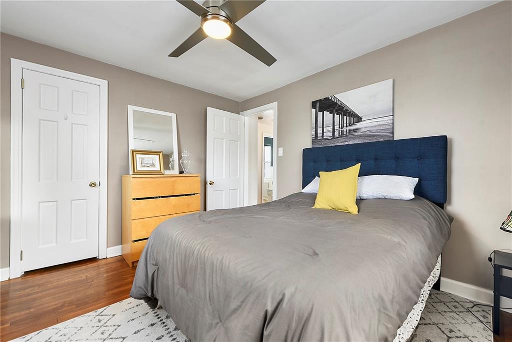 1315 Bower Hill Road Pittsburgh, PA 15243 - Photo 33 of 43 a large bed sitting in a bedroom and chandelier