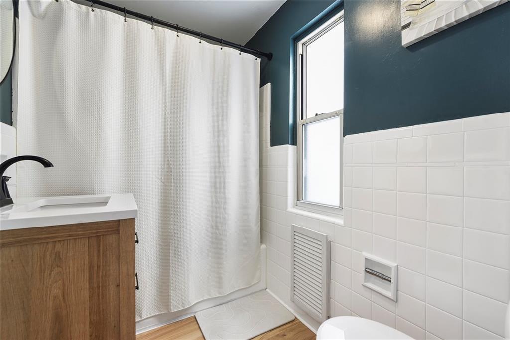 1315 Bower Hill Road Pittsburgh, PA 15243 - Photo 36 of 43 a bathroom with a sink and a mirror