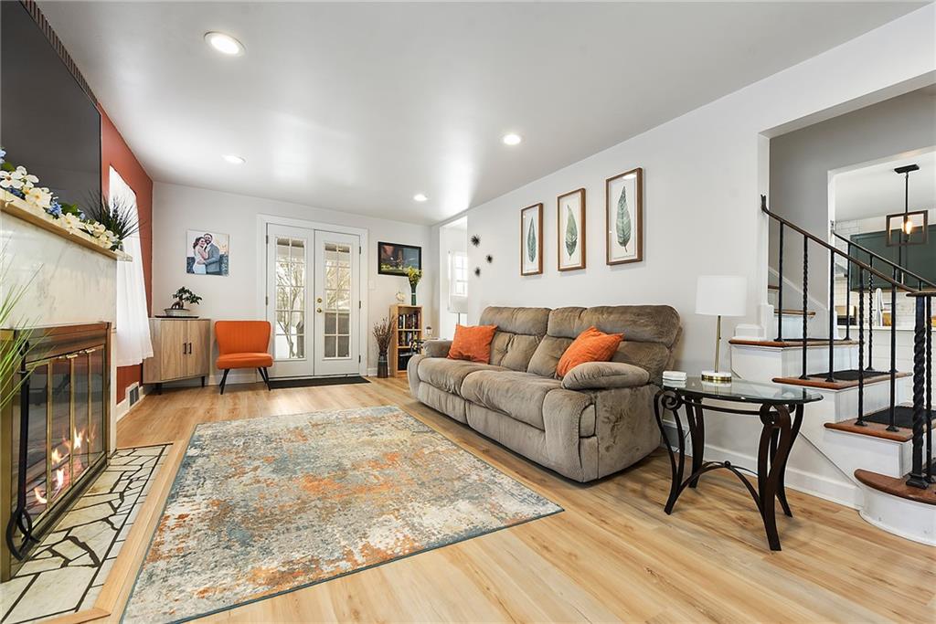 1315 Bower Hill Road Pittsburgh, PA 15243 - Photo 6 of 43 a living room with furniture and a wooden floor