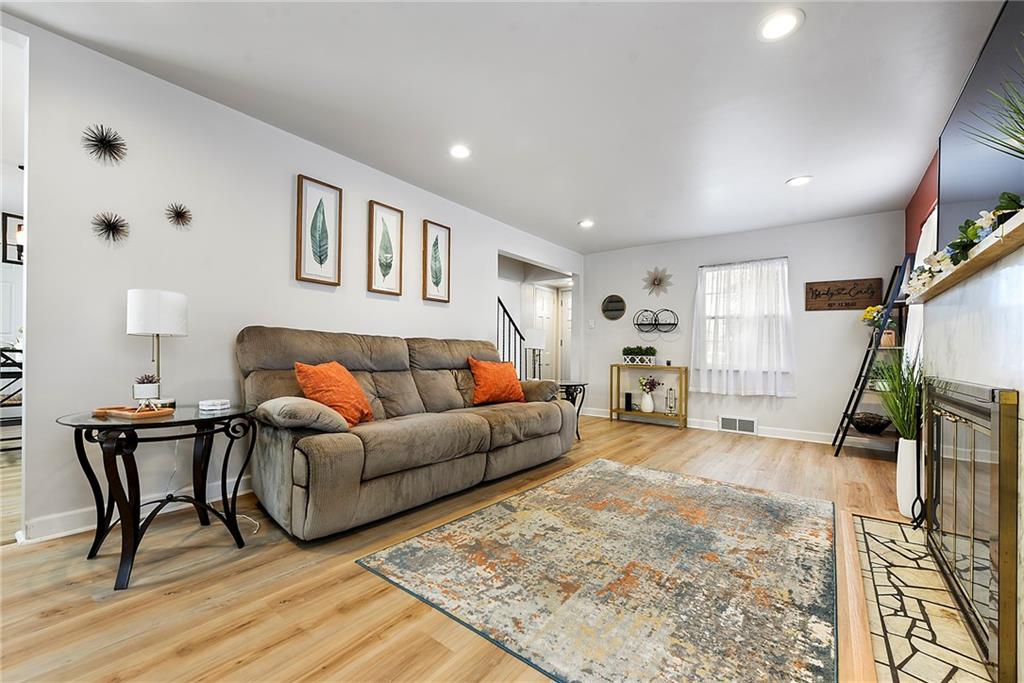 1315 Bower Hill Road Pittsburgh, PA 15243 - Photo 10 of 43 a living room with furniture and a flat screen tv