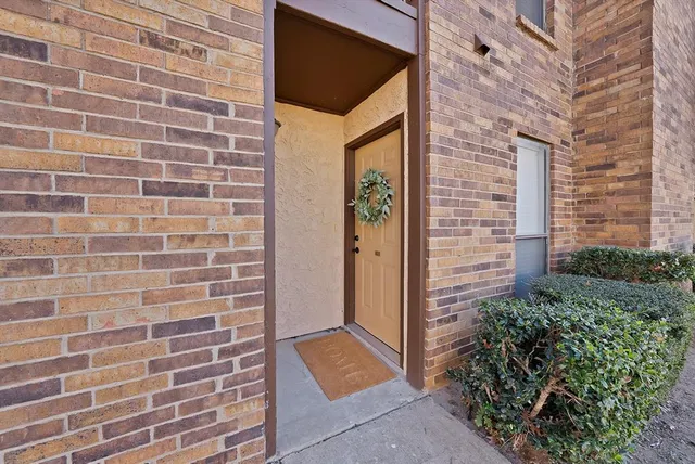 a bathroom with a shower and a mirror