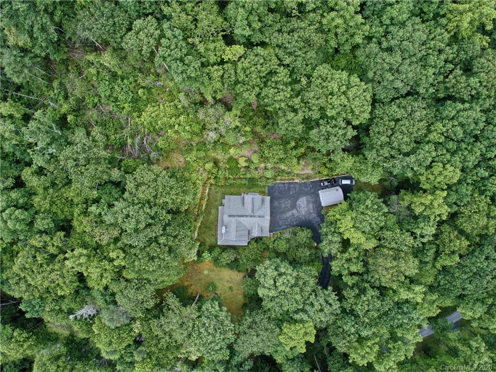 2322 Locust Grove Road Hendersonville, NC 28792 - Photo 36 of 40 an aerial view of a house with a yard
