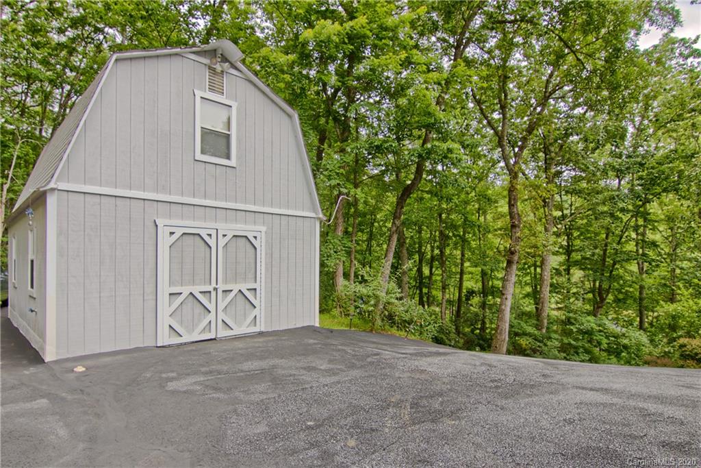 2322 Locust Grove Road Hendersonville, NC 28792 - Photo 40 of 40 a house with a outdoor space