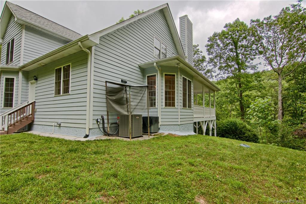 2322 Locust Grove Road Hendersonville, NC 28792 - Photo 5 of 40 a view of front a house with a yard