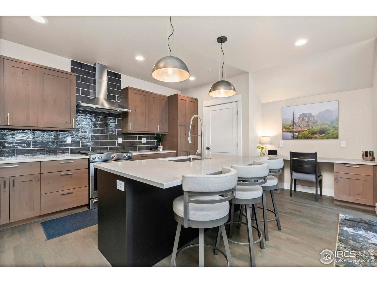 910 Hill Pond Road, Unit 15 Fort Collins, CO 80526 - Photo 15 of 43 a open kitchen with a sink dining table and chairs
