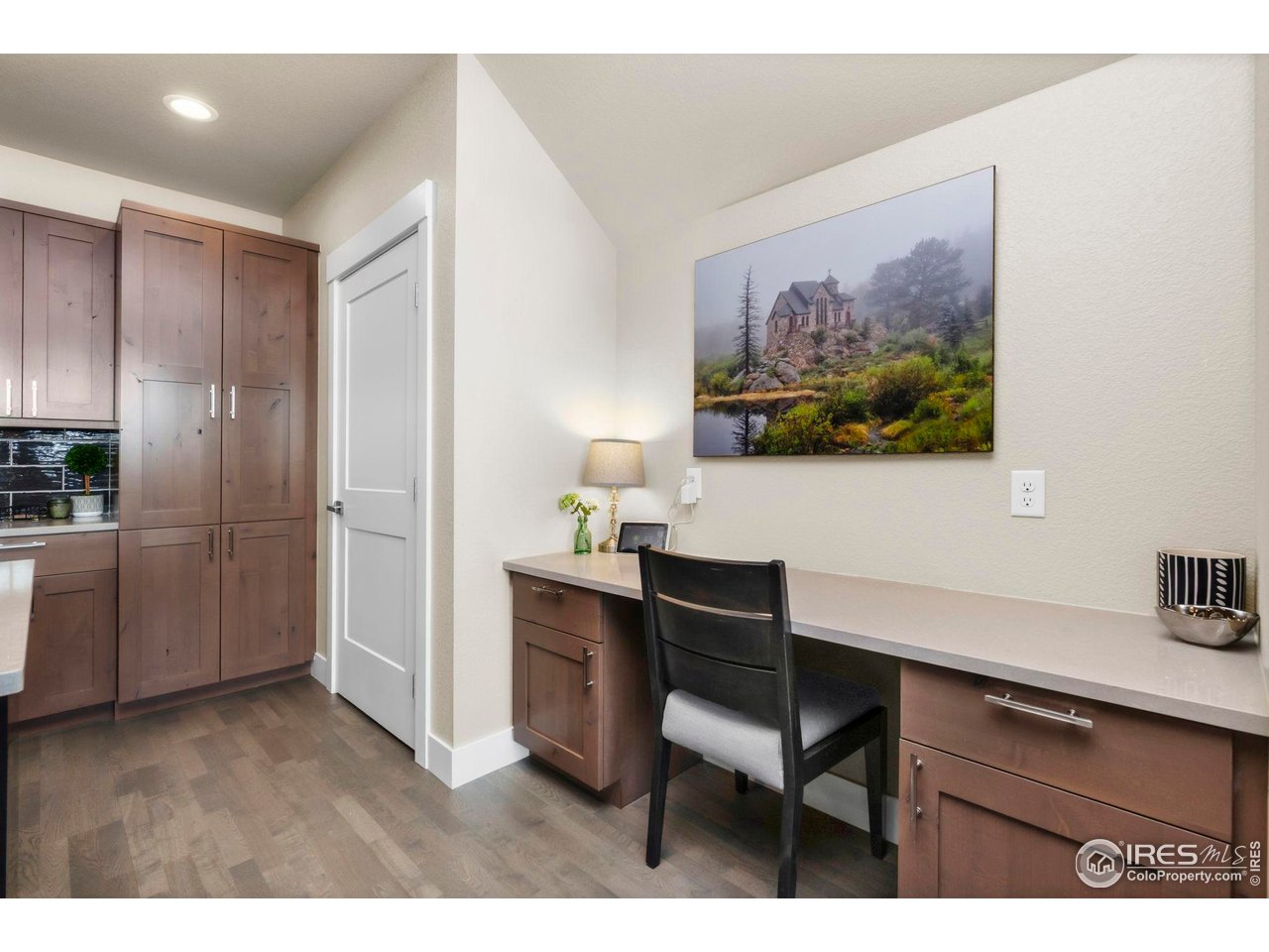 910 Hill Pond Road, Unit 15 Fort Collins, CO 80526 - Photo 18 of 43 a view of a workspace with furniture and wooden floor