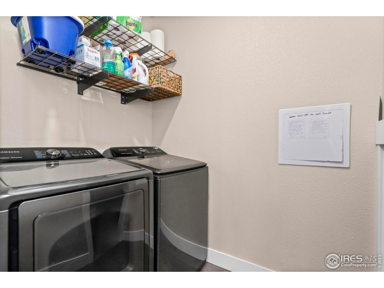 910 Hill Pond Road, Unit 15 Fort Collins, CO 80526 - Photo 19 of 43 a utility room with dryer and washer