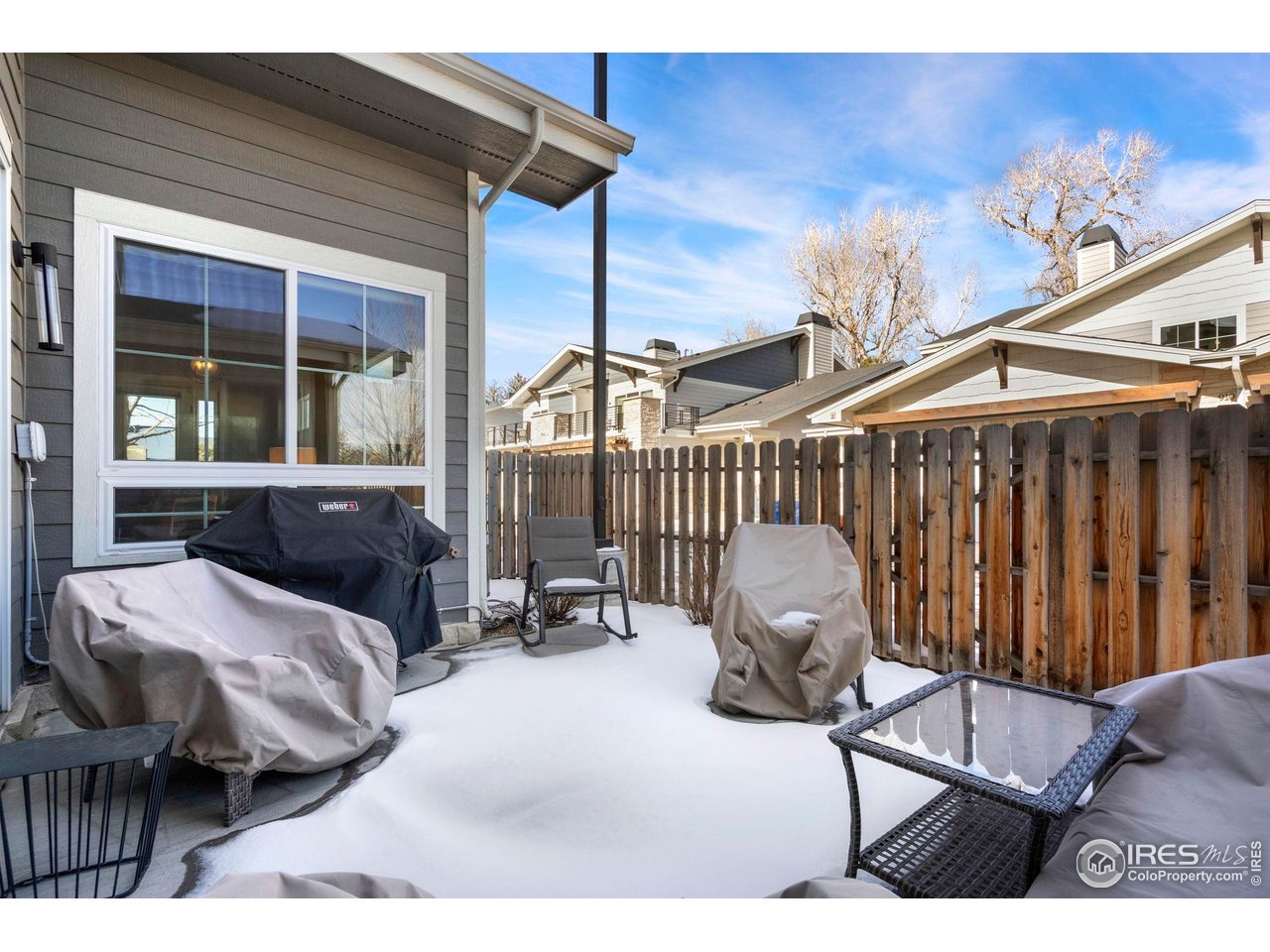 910 Hill Pond Road, Unit 15 Fort Collins, CO 80526 - Photo 34 of 43 a bedroom with furniture and a window