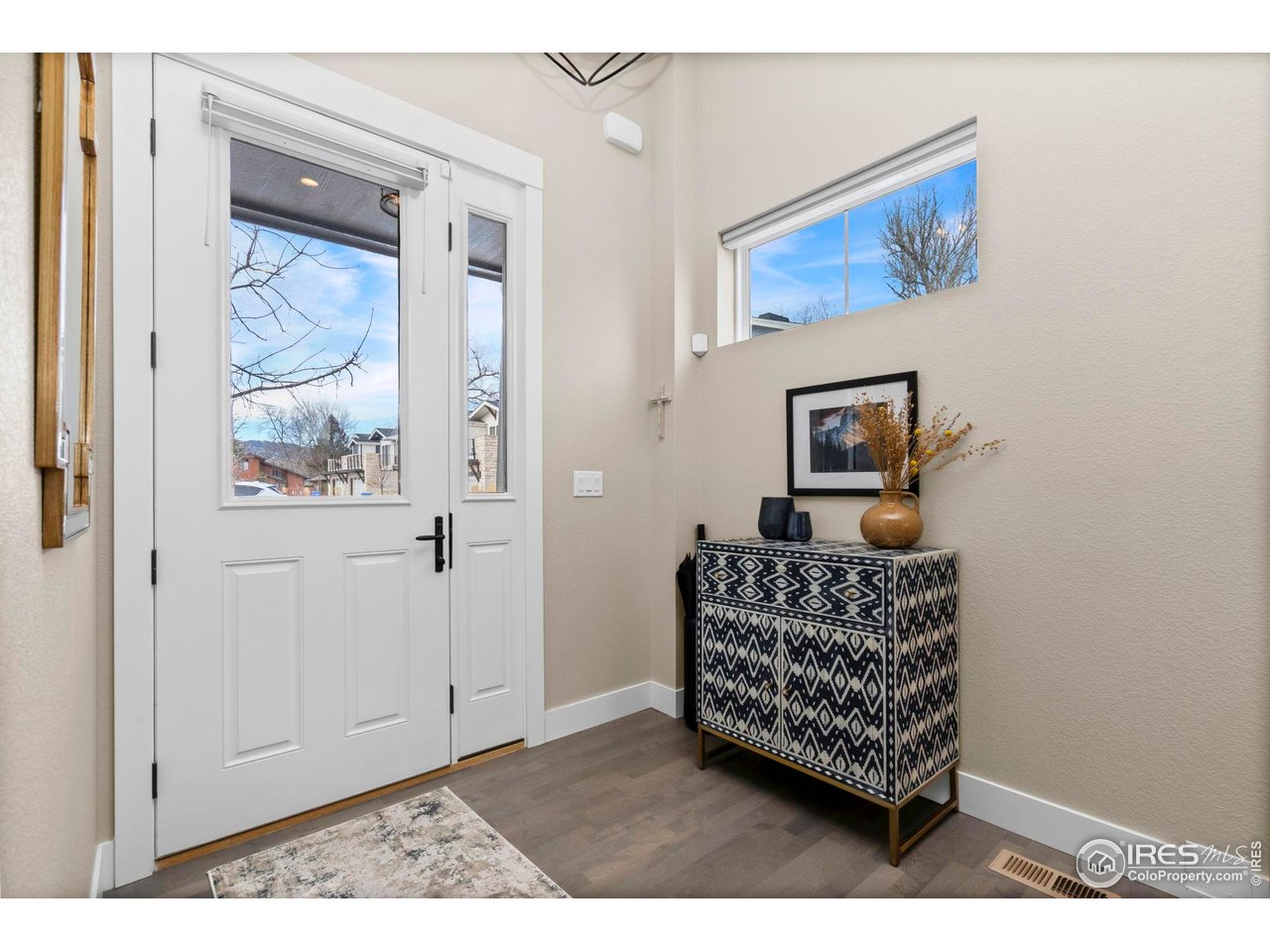 910 Hill Pond Road, Unit 15 Fort Collins, CO 80526 - Photo 4 of 43 a living room with furniture and a window