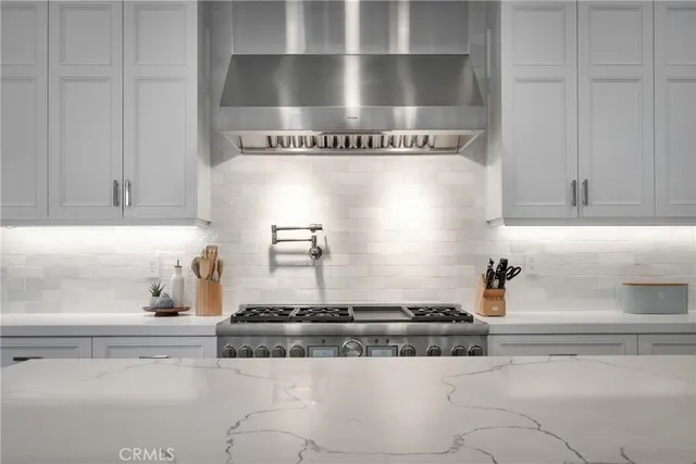 a spacious bedroom with a bed and a fireplace