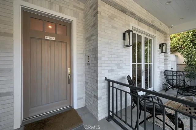 a kitchen with a sink and large window